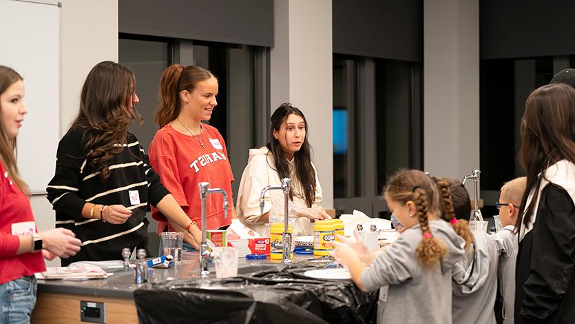 Students and future educators work in collaboration at the science lab stations inside of the new Teaching Methods Lab. 